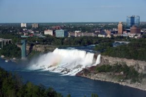 Niagara Falls against Buffalo skyline