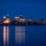 A night time waterfront skyline of Buffalo NY as Ellicott Development lists their waterfront venues