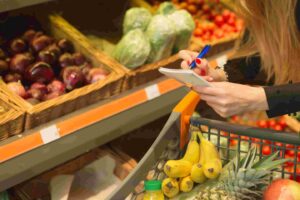 Grocery shopping at the store in the fruit section